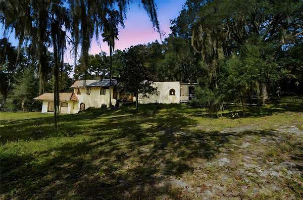 2.12 Acres of Residential Land with Home for Sale in Orange City, Florida
