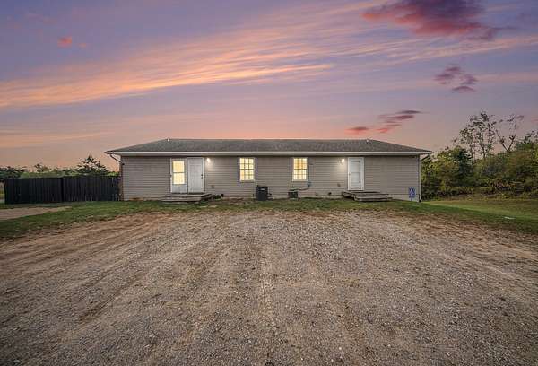 3.2 Acres of Residential Land with Home for Sale in Cement City, Michigan