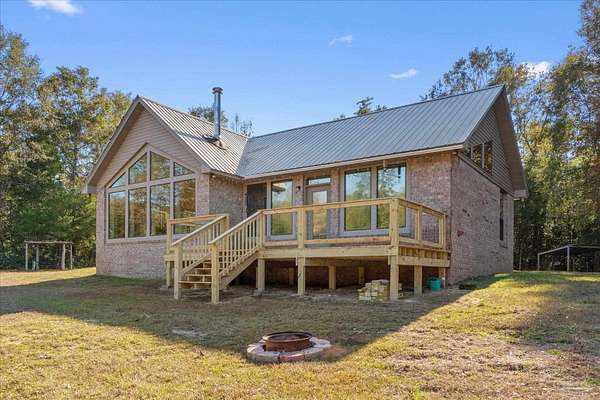 4.49 Acres of Residential Land with Home for Sale in Molino, Florida