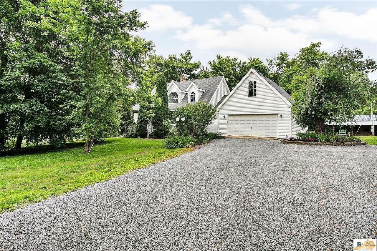 5.5 Acres of Land with Home for Sale in Greensburg, Kentucky