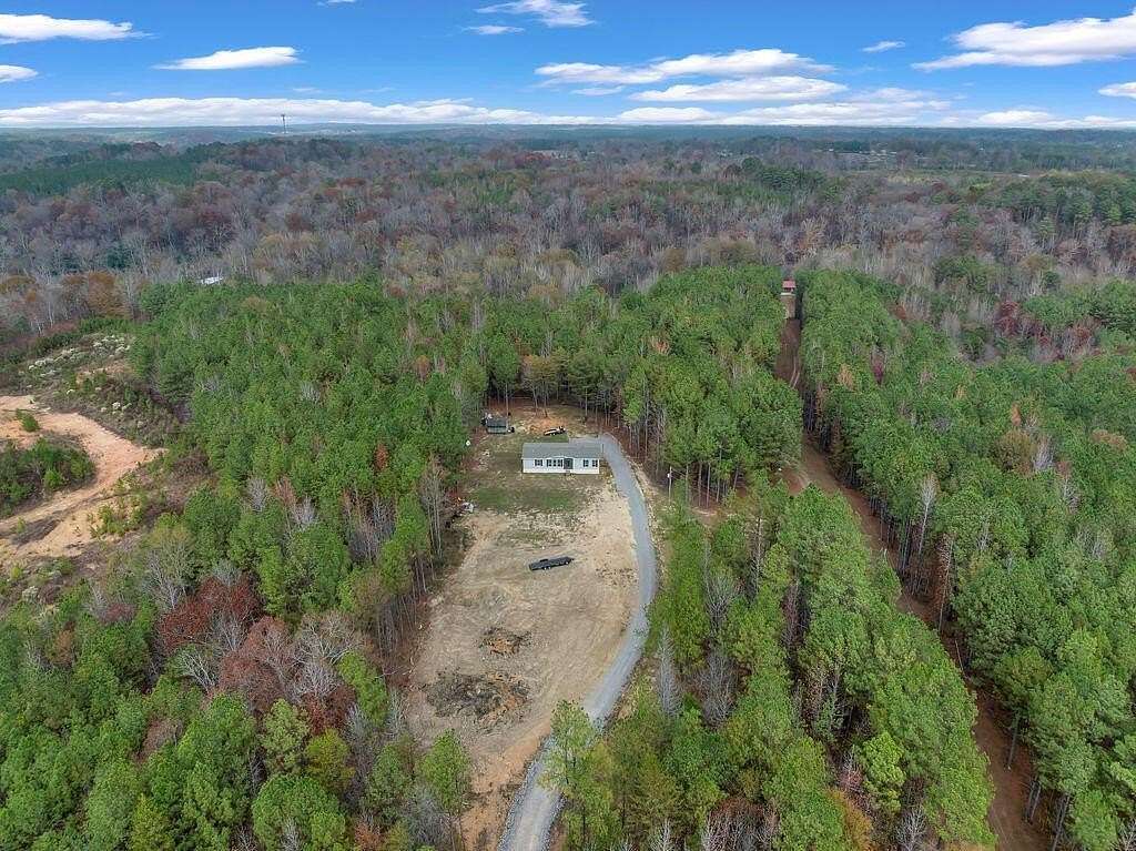 66 Acres of Land with Home for Sale in Cordova, Alabama