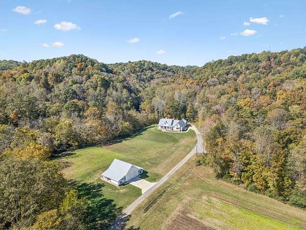 94.3 Acres of Agricultural Land with Home for Sale in Whites Creek, Tennessee