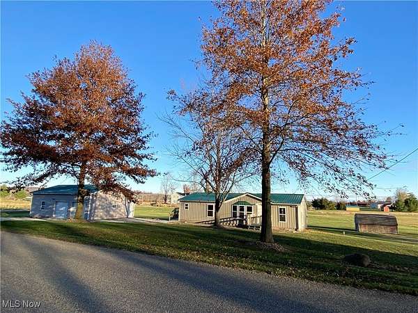 2.4 Acres of Residential Land with Home for Sale in Shreve, Ohio