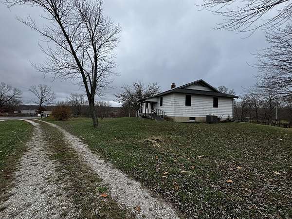 39.2 Acres of Land with Home for Sale in Mansfield, Missouri