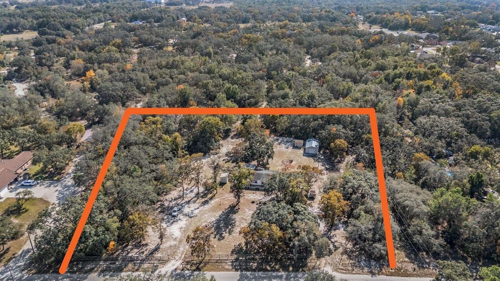 3 Acres of Residential Land with Home for Sale in Spring Hill, Florida