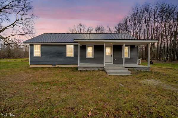 12.2 Acres of Land with Home for Sale in Conneaut, Ohio