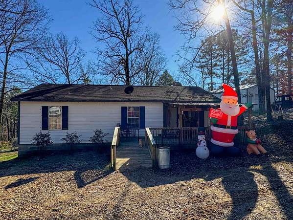 8 Acres of Residential Land with Home for Sale in Evening Shade, Arkansas