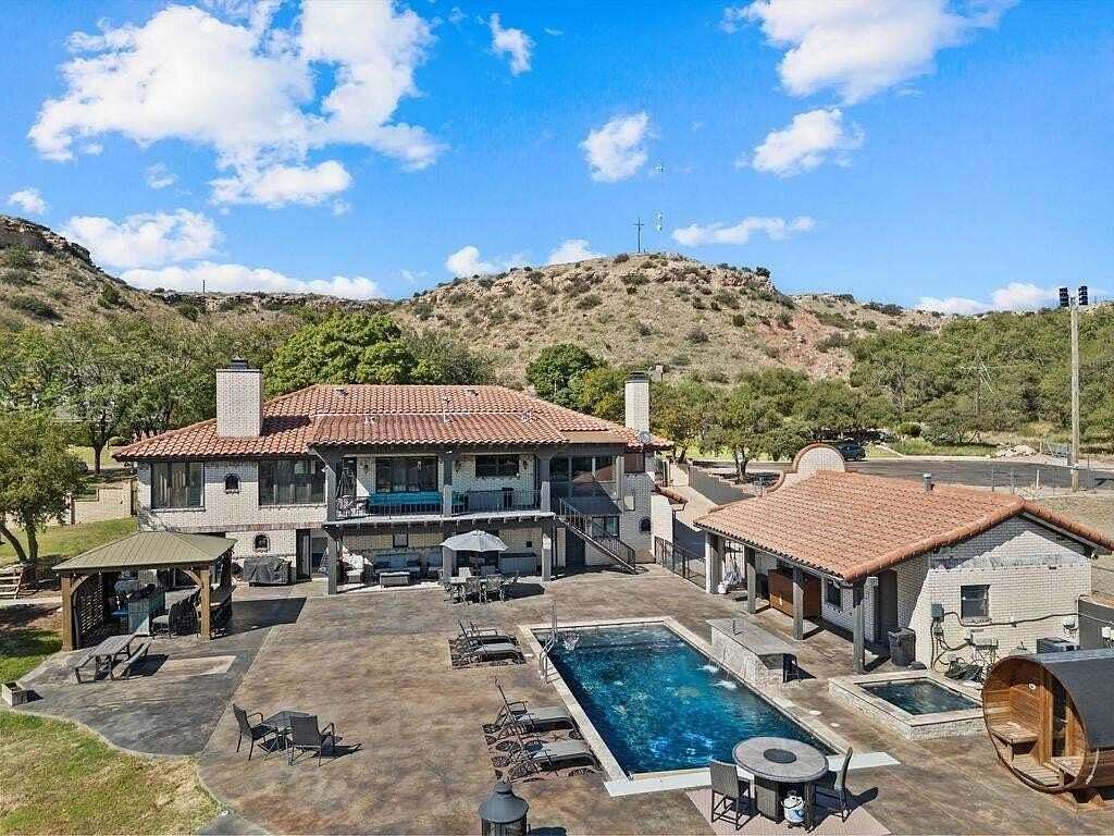 1.73 Acres of Residential Land with Home for Sale in Ransom Canyon, Texas