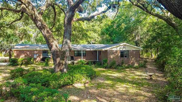 2.4 Acres of Residential Land with Home for Sale in Pensacola, Florida