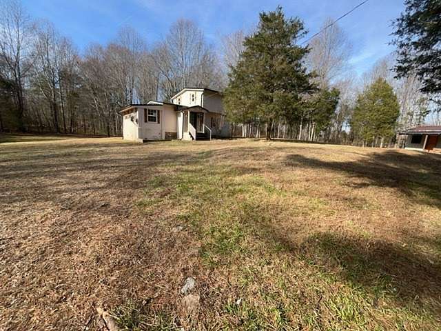 6.27 Acres of Residential Land with Home for Sale in Bon Aqua, Tennessee
