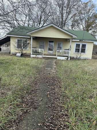 80 Acres of Agricultural Land with Home for Sale in Okolona, Arkansas