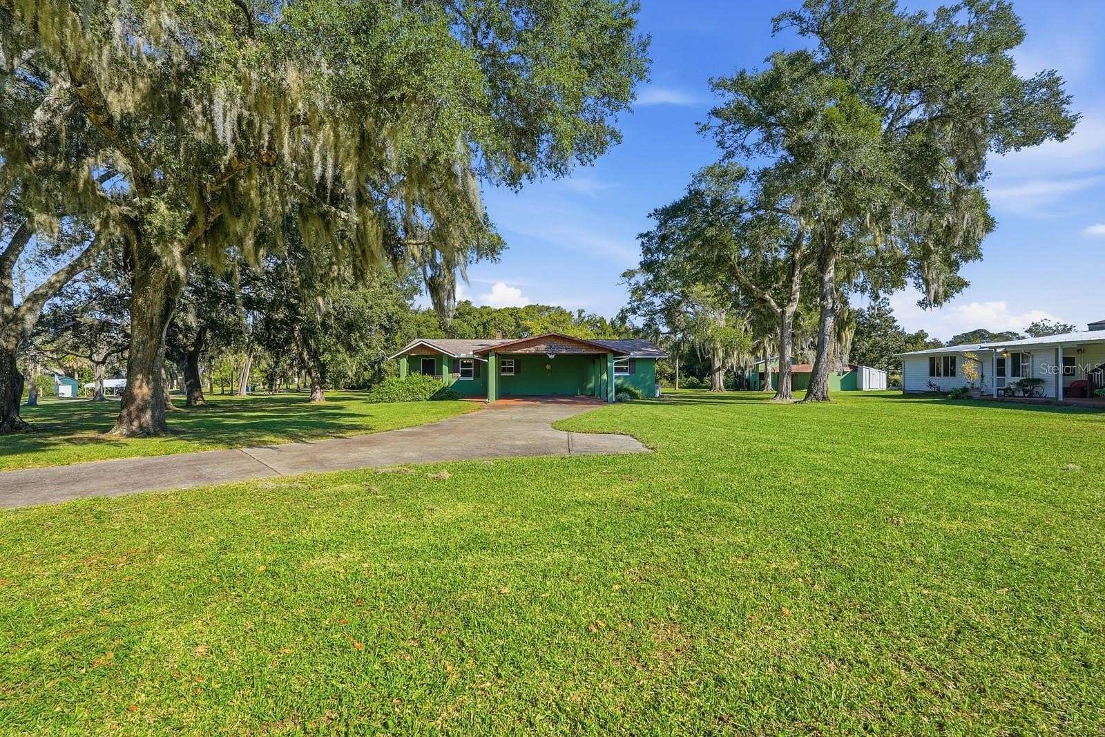 3 Acres of Residential Land with Home for Sale in Oak Hill, Florida