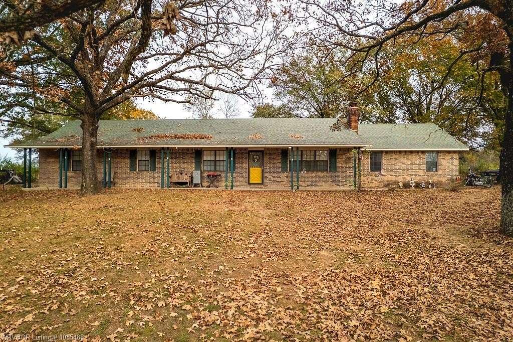 7.68 Acres of Land with Home for Sale in Sallisaw, Oklahoma
