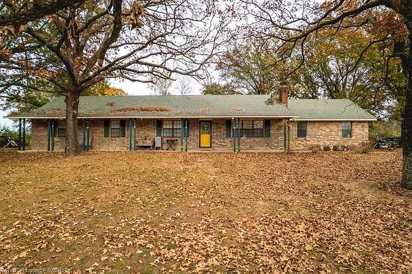 7.68 Acres of Land with Home for Sale in Sallisaw, Oklahoma
