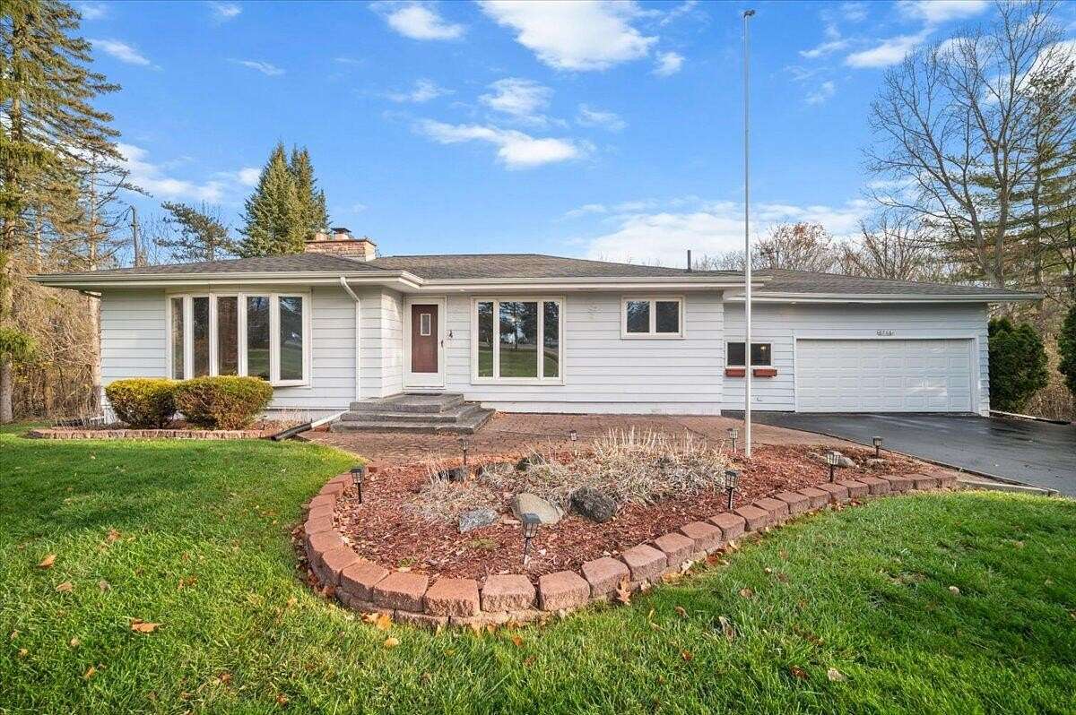 1.5 Acres of Residential Land with Home for Sale in Flushing, Michigan