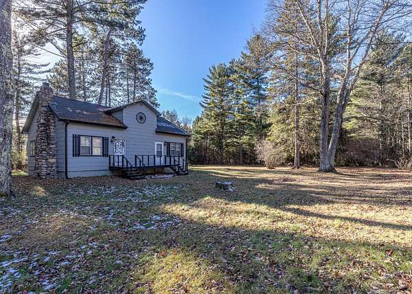4 Acres of Residential Land with Home for Sale in Minocqua, Wisconsin