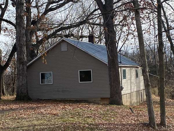 9 Acres of Land with Home for Sale in Lyons, Michigan