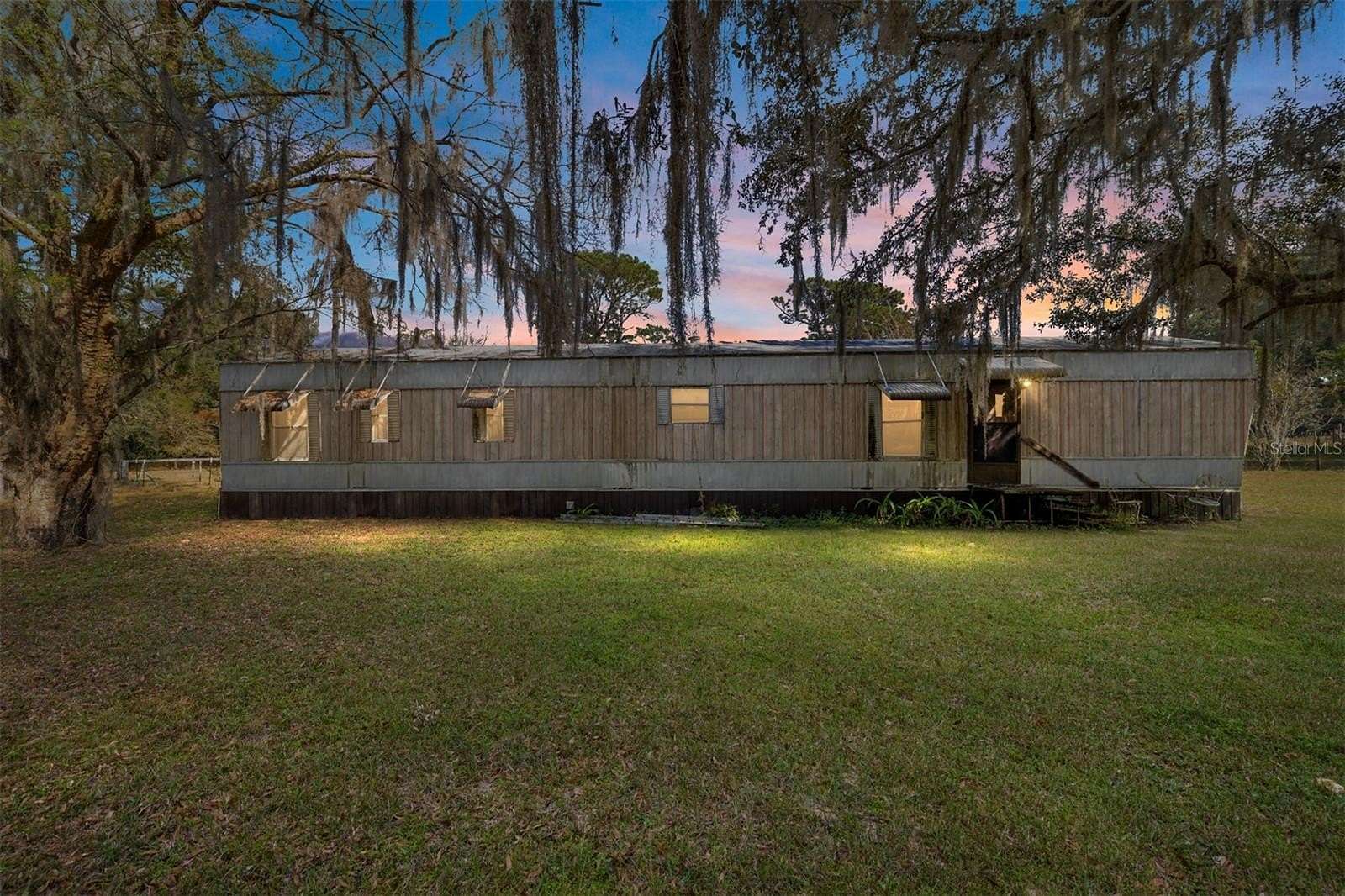 1.56 Acres of Residential Land with Home for Sale in Fort McCoy, Florida