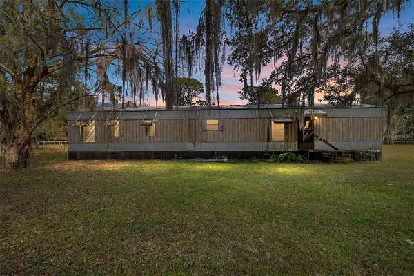 1.56 Acres of Residential Land with Home for Sale in Fort McCoy, Florida