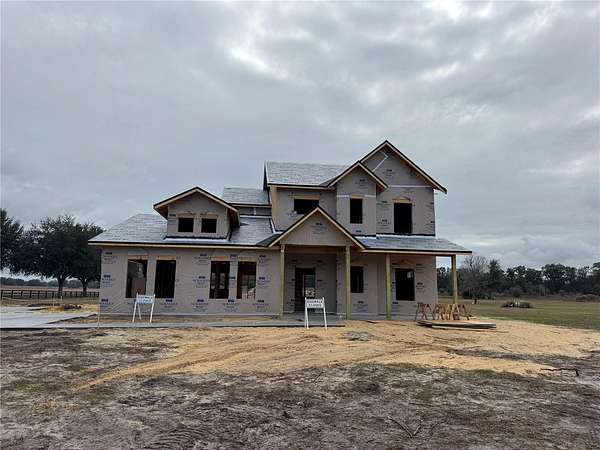 2.5 Acres of Residential Land with Home for Sale in High Springs, Florida