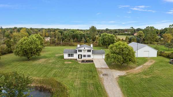 4 Acres of Residential Land with Home for Sale in Riley, Michigan