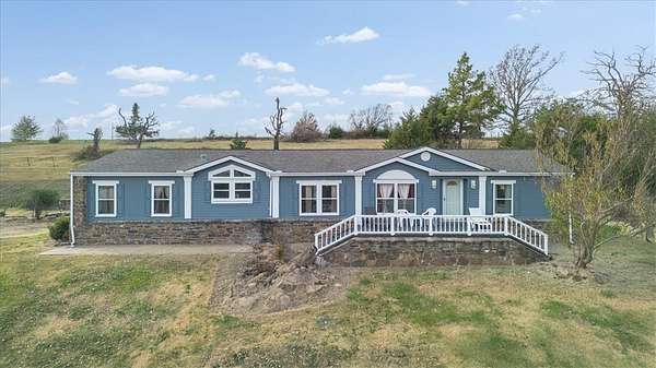 15 Acres of Land with Home for Sale in Huntsville, Arkansas