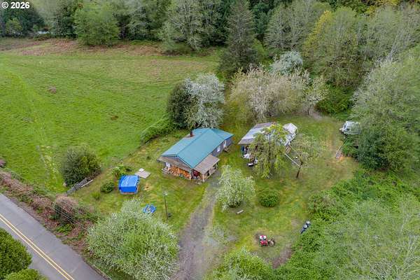 86 Acres of Land with Home for Sale in Coquille, Oregon