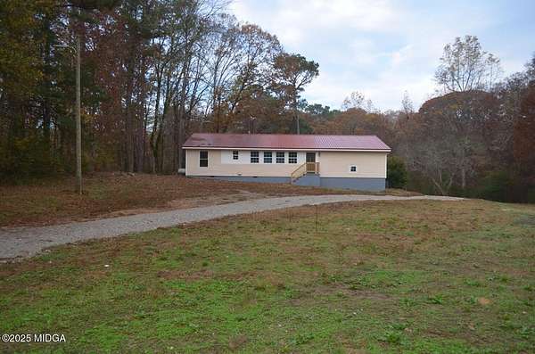4.78 Acres of Residential Land with Home for Sale in Jackson, Georgia