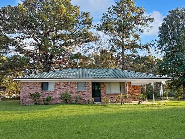 8.46 Acres of Land with Home for Sale in Woodville, Texas