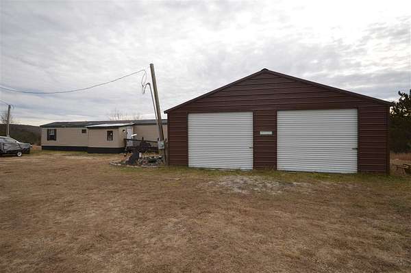 3.27 Acres of Residential Land with Home for Sale in Mancelona, Michigan