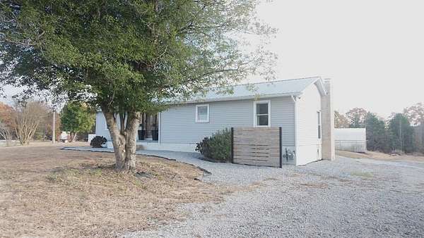 20 Acres of Land with Home for Sale in Huntingdon, Tennessee