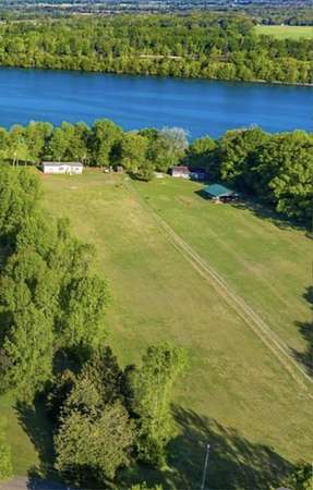 4.3 Acres of Residential Land with Home for Sale in Decatur, Tennessee