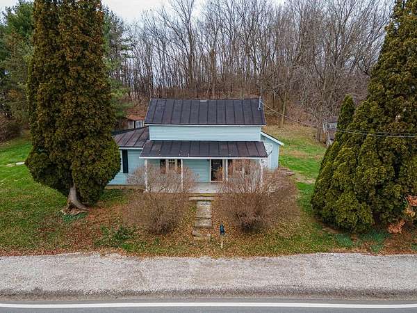 3.75 Acres of Residential Land with Home for Sale in Fredericktown, Ohio