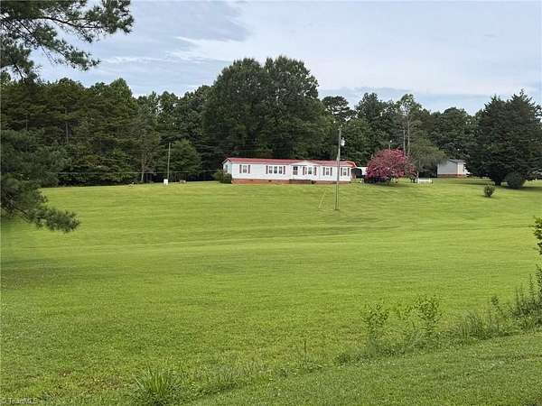 2.68 Acres of Residential Land with Home for Sale in Pinnacle, North Carolina