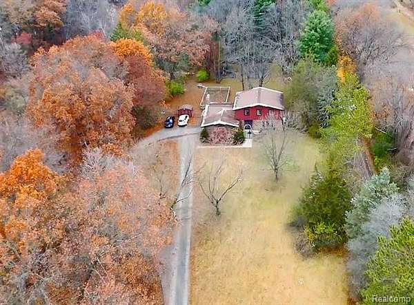 2.5 Acres of Land with Home for Sale in Groveland Township, Michigan