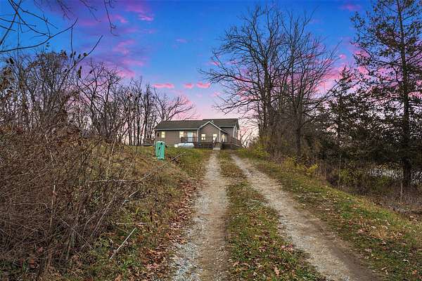 6 Acres of Residential Land with Home for Sale in Hudson, Michigan