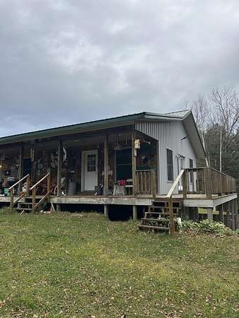 29.7 Acres of Recreational Land with Home for Sale in Grand Marais, Michigan