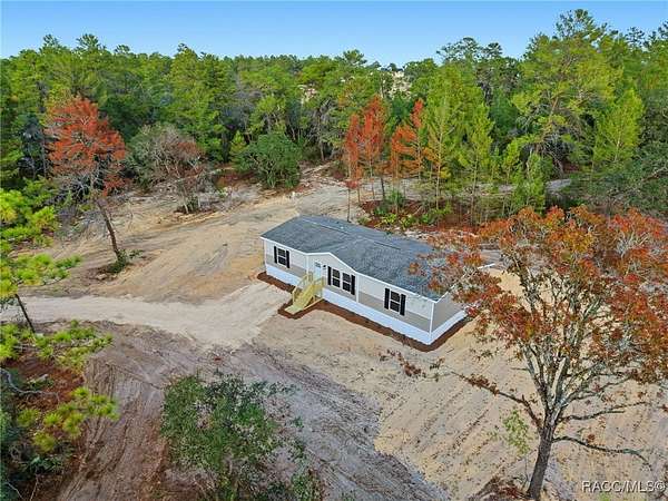 2.63 Acres of Residential Land with Home for Sale in Dunnellon, Florida