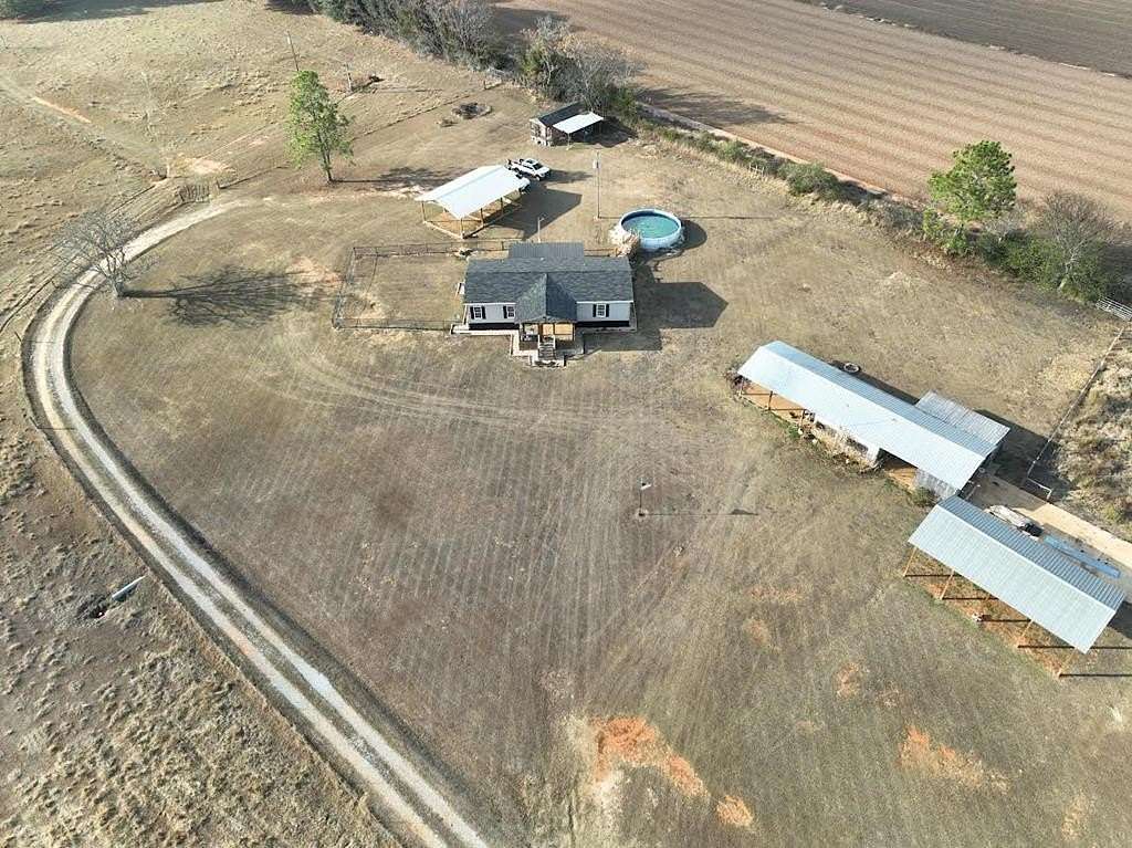 30.6 Acres of Land with Home for Sale in Blakely, Georgia