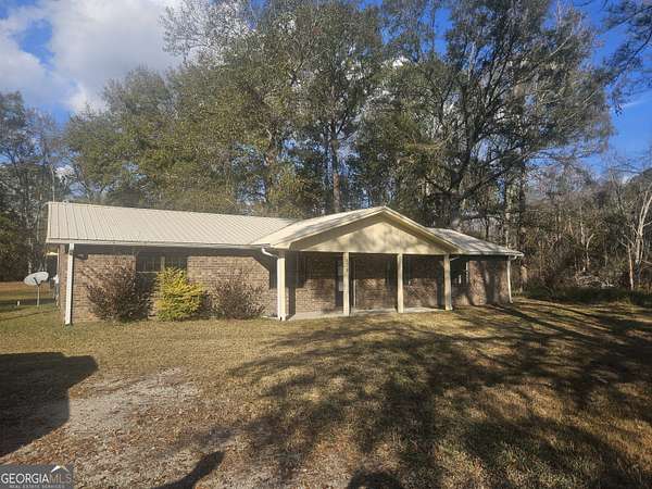 1.63 Acres of Residential Land with Home for Sale in Metter, Georgia