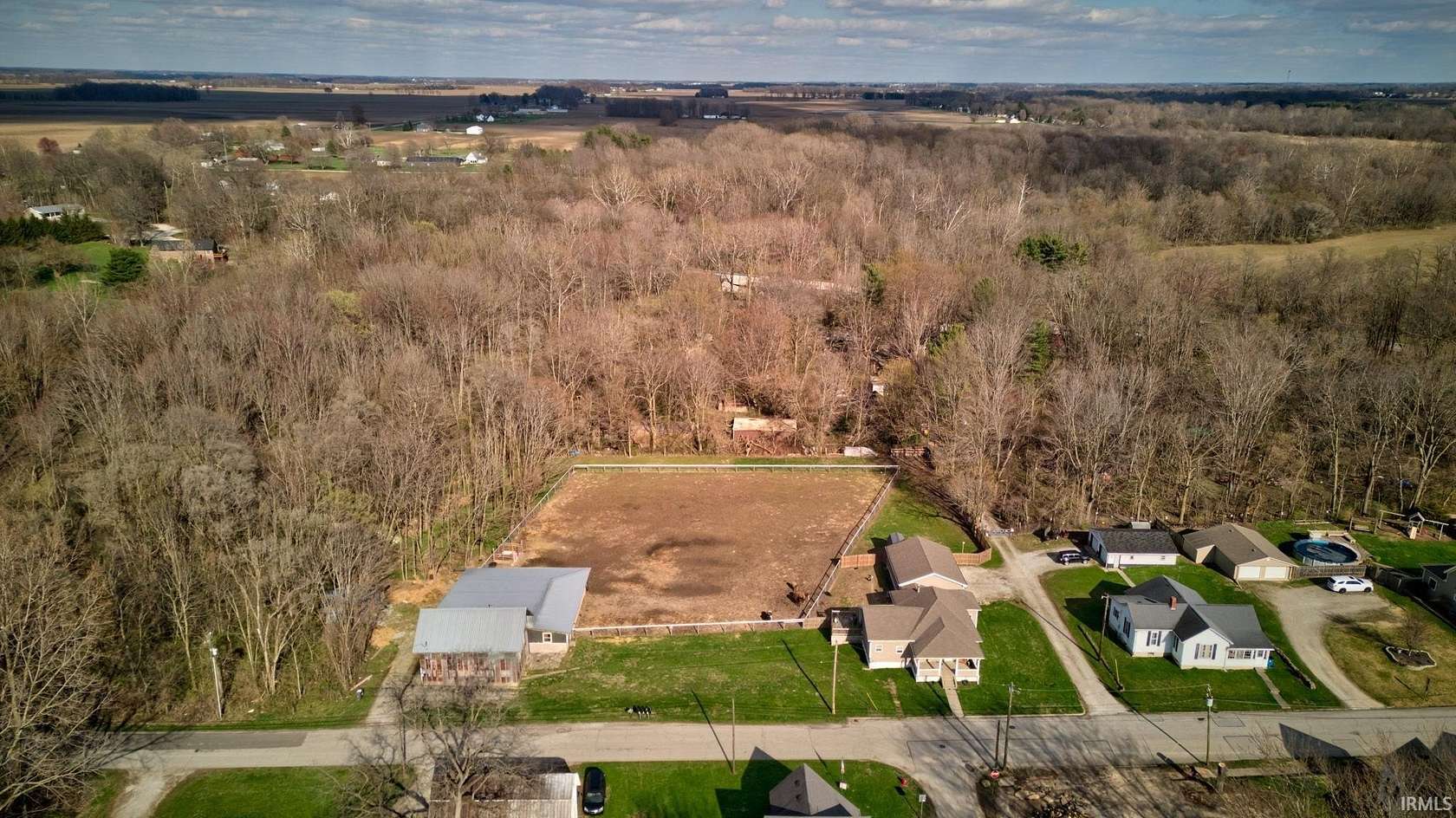 2.5 Acres of Residential Land with Home for Sale in Galveston, Indiana