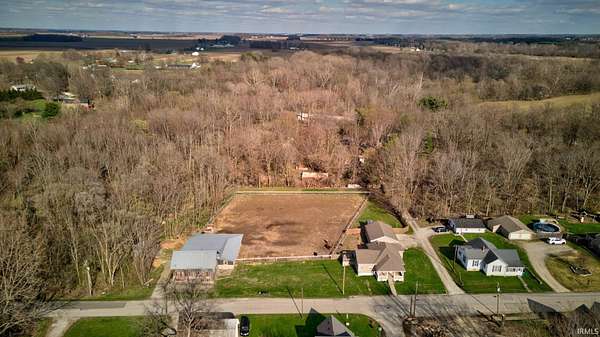 2.5 Acres of Residential Land with Home for Sale in Galveston, Indiana