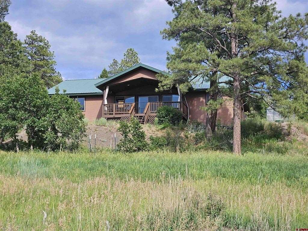 5 Acres of Residential Land with Home for Sale in Pagosa Springs, Colorado