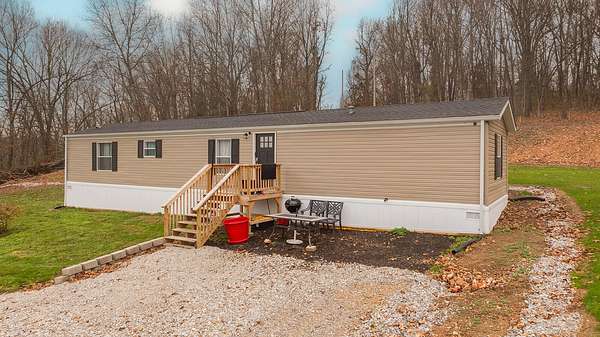 3 Acres of Residential Land with Home for Sale in Aurora, Missouri