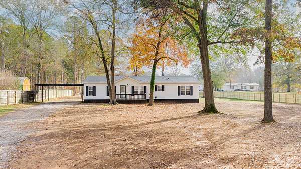 2 Acres of Residential Land with Home for Sale in Marshall, Texas