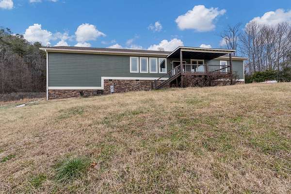 49.6 Acres of Agricultural Land with Home for Sale in Washburn, Tennessee