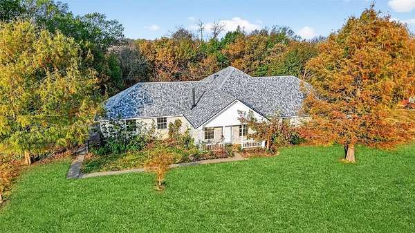 1.55 Acres of Residential Land with Home for Sale in Denison, Texas