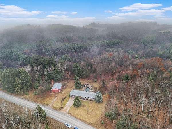 10 Acres of Recreational Land with Home for Sale in Shelby, Michigan