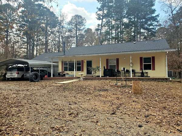 6.38 Acres of Land with Home for Sale in Norman, Arkansas