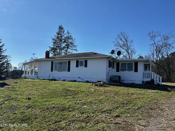 9.77 Acres of Land with Home for Sale in Tellico Plains, Tennessee